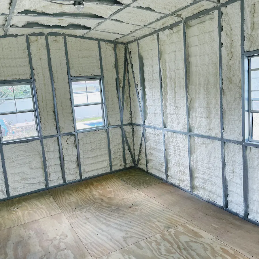 Closed-cell spray foam insulation applied to wall cavities in a residential project in Rapid City